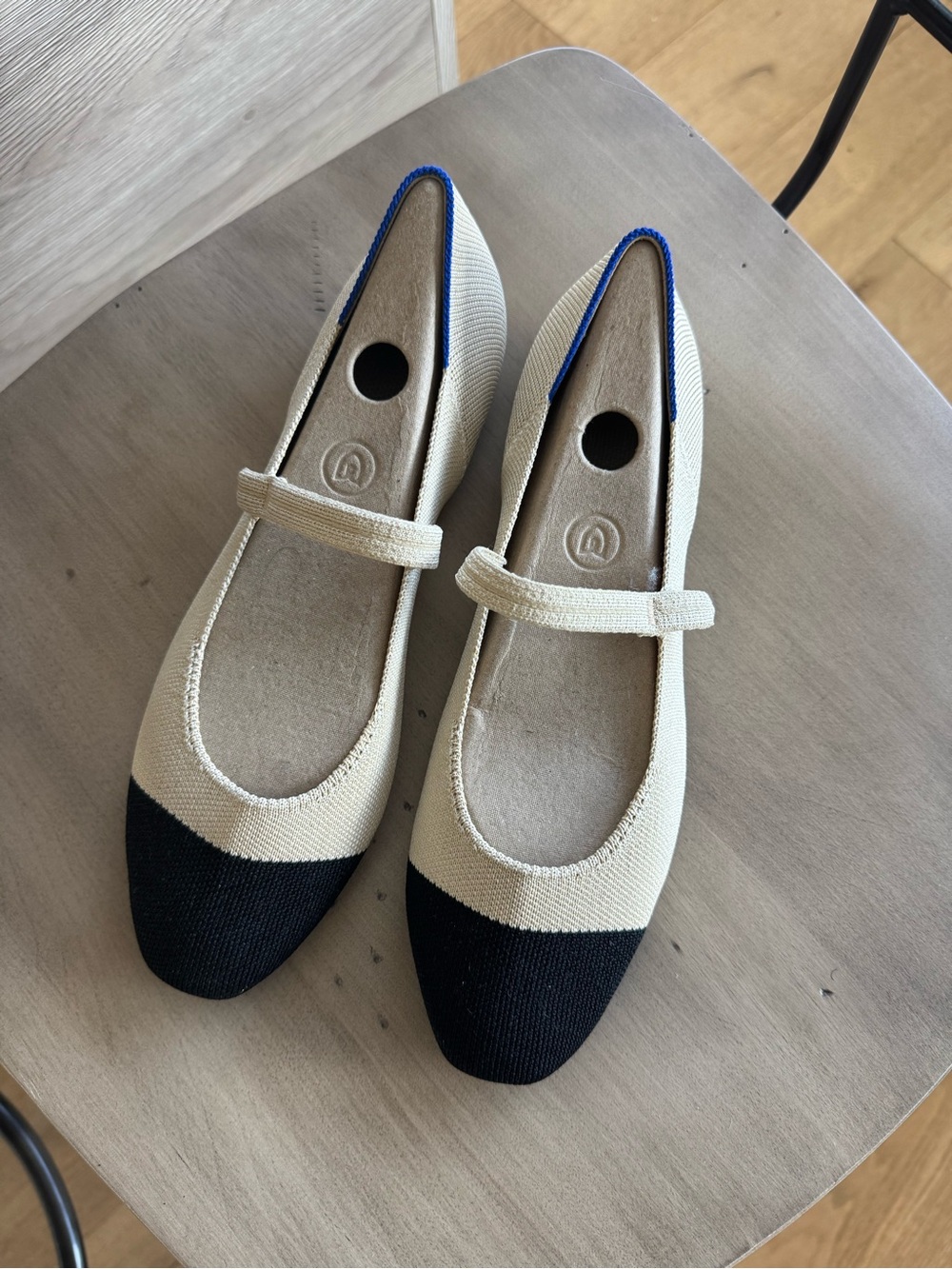 Rothy's Two-Tone Mary Jane Flats in Cream and Black with Blue Trim